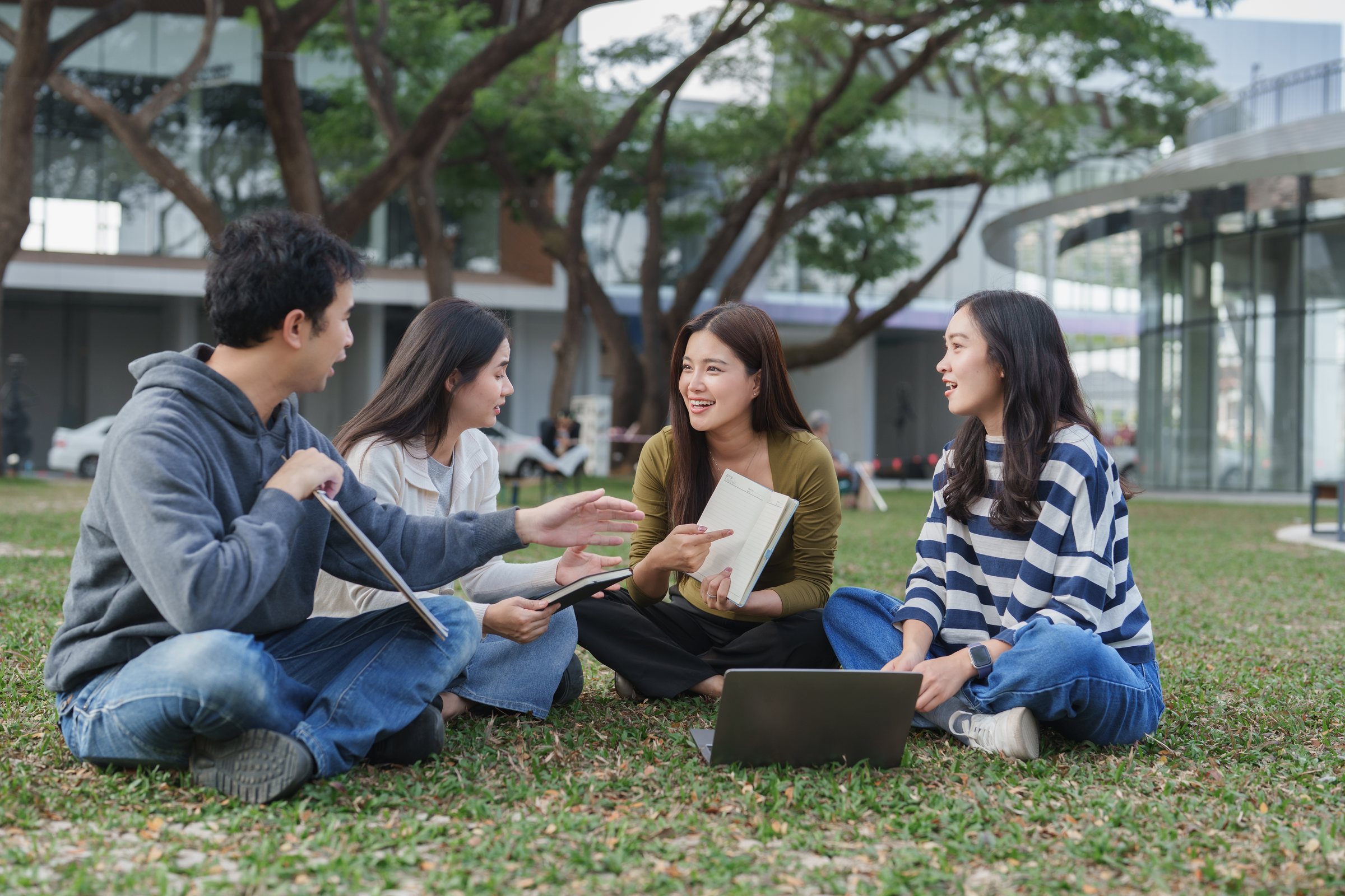 UCSI students sitting together on campus